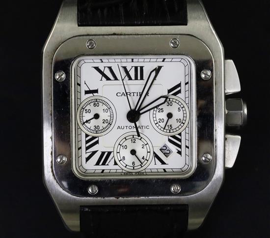A gentlemans 2013 stainless steel Cartier Santos 100 automatic chronograph wrist watch, with box and booklets.